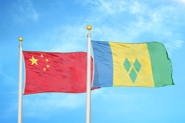 China and Saint Vincent and the Grenadines two flags on flagpoles