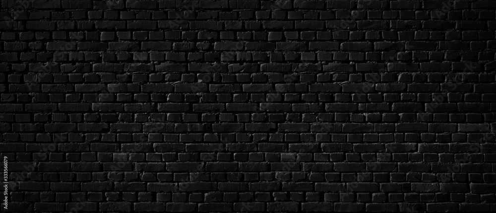 Texture of a black brick wall as a background or wallpaper - obrazy, fototapety, plakaty 
