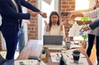© Krakenimages.com - Group of business workers working together. Partners stressing one of them at the office