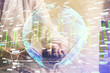 © peshkova - Double exposure of woman hands typing on computer and business theme hologram drawing. Success concept.
