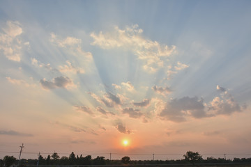 Bright orange sky and light of the sun.