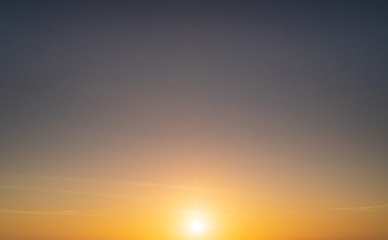 Wall Mural - abstract amazing scene of stuning colorful sunset with moving clouds background in nature and travel