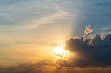 Wall Mural - abstract amazing scene of stuning colorful sunset with moving clouds background in nature and travel