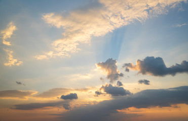 Wall Mural - abstract amazing scene of stuning colorful sunset with moving clouds background in nature and travel
