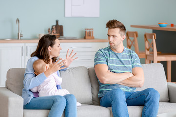 Poster - Stressed couple suffering from postnatal depression at home