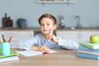 © Pixel-Shot - Little boy doing lessons at home
