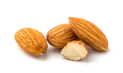 Wall Mural - Almonds isolated on white background