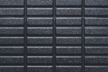 Wall Mural - Black plastic texture. ribbed pattern. rough surface background