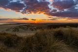 Fototapeta Krajobraz - March sunset from Camber Sands East Sussex