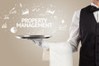 © ra2 studio - Waiter serving business idea concept with PROPERTY MANAGEMENT inscription