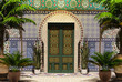 Arabic home facade with front door, yard and palm trees
