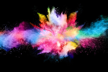 abstract colored dust explosion on a black background.abstract powder splatted background,freeze mot