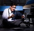 © Elnur - Doctor working night shift in hospital after long hours