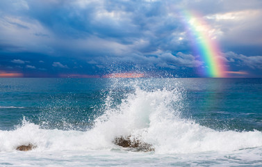 Wall Mural - Storm on the sea with amazing rainbow 