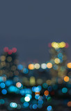 Fototapeta Miasto - Vertical cover of blurred bokeh cityscape at twilight time, city background, aerial view angle from rooftop ob building, defocused city in downtown,graphic design for web online or book vertical cover