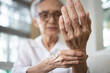 © Satjawat - Elderly female patient suffer from numbing pain in hand,numbness fingertip,arthritis inflammation,beriberi or peripheral neuropathies,senior woman massage her hand with wrist pain,rheumatoid arthritis
