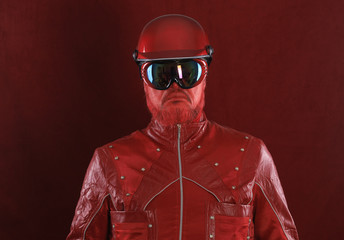 Poster - portrait of a biker with a red beard and in a red leather jacket