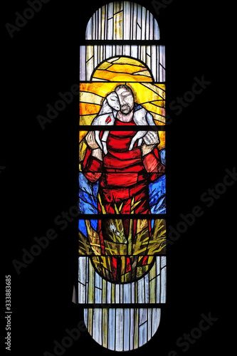 Jesus the Good Shepherd, stained glass window by Sieger Koder in Chapel at cemetery in Ursberg, Germany
