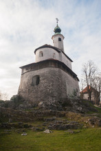 Mali Grad Or Small Castle In Kamnik, Slovenia. One Of The Most Famous Landmarks In The Old City Center. Church Build On Top Of A Small Hill In Kamnik.
