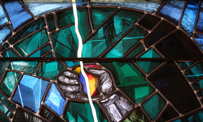 God leads his own to completion in all his glory, detail of stained glass window by Sieger Koder in church of Saint John in Piflas, Germany