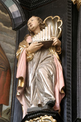 Saint Cecilia, statue on the altar of Saint Apollonia in the Church of Saint Catherine of Alexandria in Zagreb, Croatia