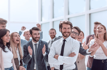 Wall Mural - young entrepreneur and happy business team standing together.