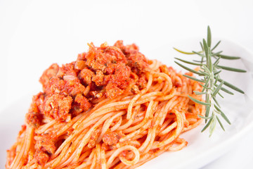 Sticker - Spaghetti bolognese on a plate	 decorated with a rosemary twig