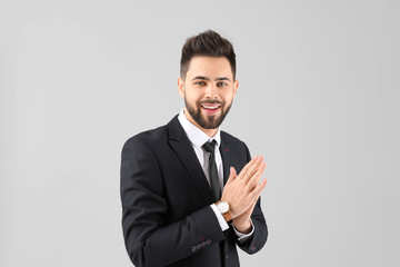 Sticker - Handsome businessman with healthy hair on light background