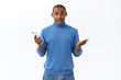 © Cookie Studio - Technology, online lifestyle concept. Portrait of surprised happy african-american man found out amazing news in internet, gesturing hold smartphone, telling about cool new mobile app
