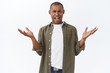 © Cookie Studio - Whats your problem. Portrait of frustrated and annoyed african-american man, spread hands sideways complaining, having argument, look confused, cant understand why person so rude