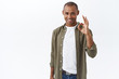 © Cookie Studio - Portrait of young african-american determined man, guarantee good quality, assure client invest in company, join team of professionals, smiling self-assured, recommend product