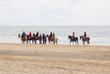 © Miroslawa Drozdowski - riders on horses on the beach close to North sea