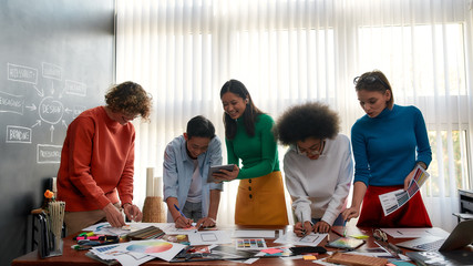 Wall Mural - project team. group of multicultural creative people prototyping new web site design while having a 