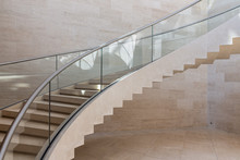 Modern Curved Staircase Made Form Marble, Steel And Glass