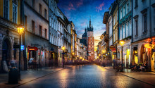 Evening View Of St. Mary's Basilica From The Florianska Street, Old Town Krakow, Poland. Panoramic View, Long Exposure, Timelapse.