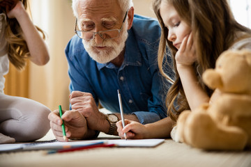 Wall Mural - Drawing with family calms your mind stock photo