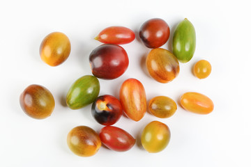 Wall Mural - Fresh ripe mixed tomato verity assorted color on white background