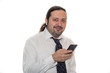 © Николай Батаев - A man in a white shirt and tie speaks on a cell phone with a wireless microphone and earpiece