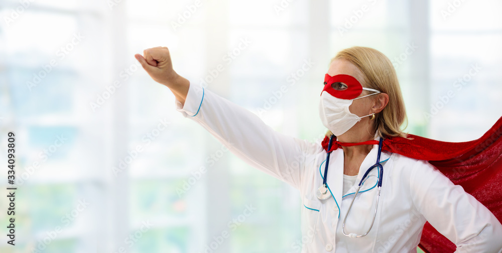 Doctor or nurse in face mask and superhero cape. - obrazy, fototapety, plakaty 
