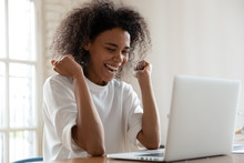 African Woman Sit At Desk Feels Excited Read Great News, Businesswoman Got Unbelievable Business Offer Opportunity, Hired On Company Position Of Dream, Lottery Win Online, Successful Betting Concept