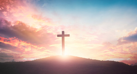 Wall Mural - easter concept: the cross on mountain sunset background