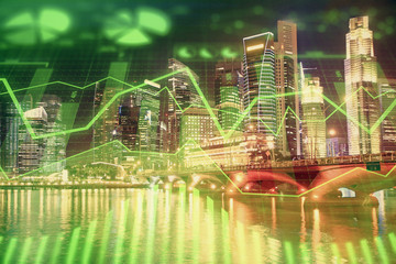 Financial chart on city scape with tall buildings background multi exposure. Analysis concept.