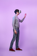 Wall Mural - man is using virtual reality headset.
