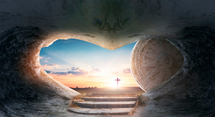 Wall Mural - Easter concept: Empty Tomb Of Jesus Christ At Sunrise With  Cross background