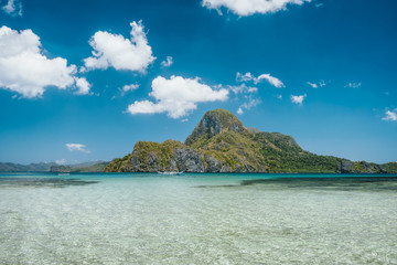 El Nido bay with beautiful Cadlao island in open ocean on sunny holiday day, Palawan, Philippines