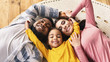 Family evening multiracial family. Daughter hugging parents