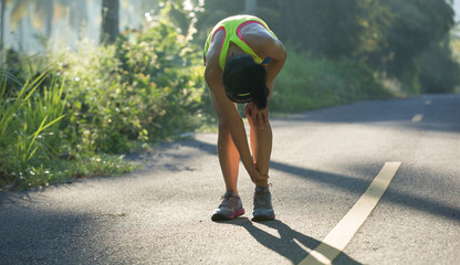 Sticker - Young fitness woman runner got sports injury on knee