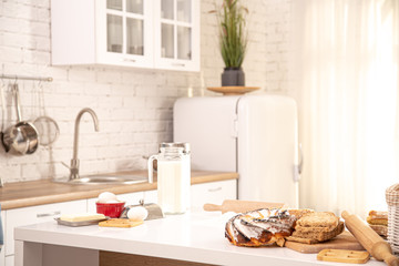 Home kitchen interior with fresh pastries on the table.