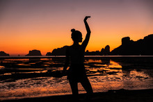 Dancer Silhouette In Sunset On The Beach In Thailand