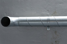 Grey Vent Pipe Is Fixed On Grey Ceiling Wall Fasteners